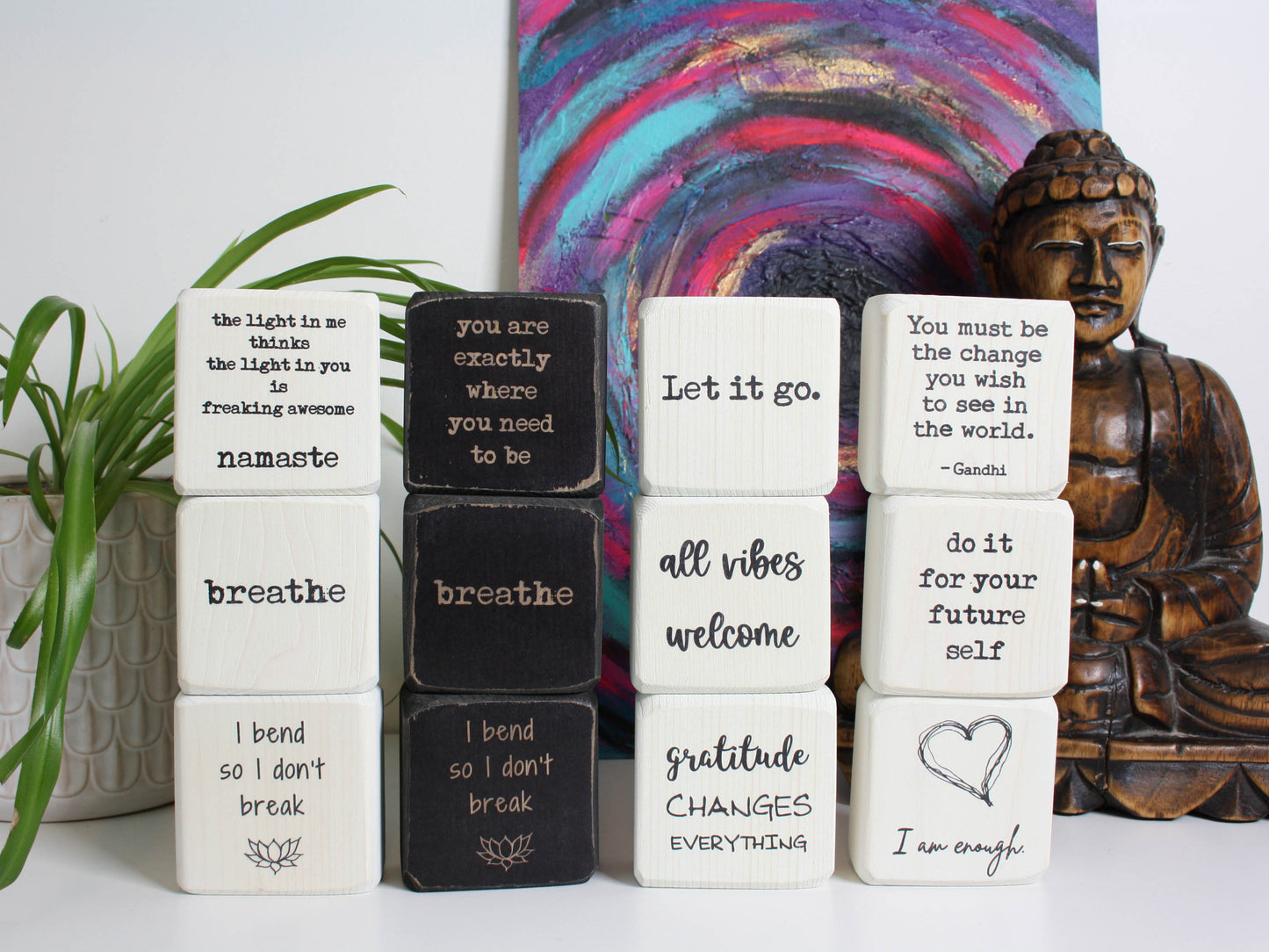 12 yoga themed quote blocks all stacked up
