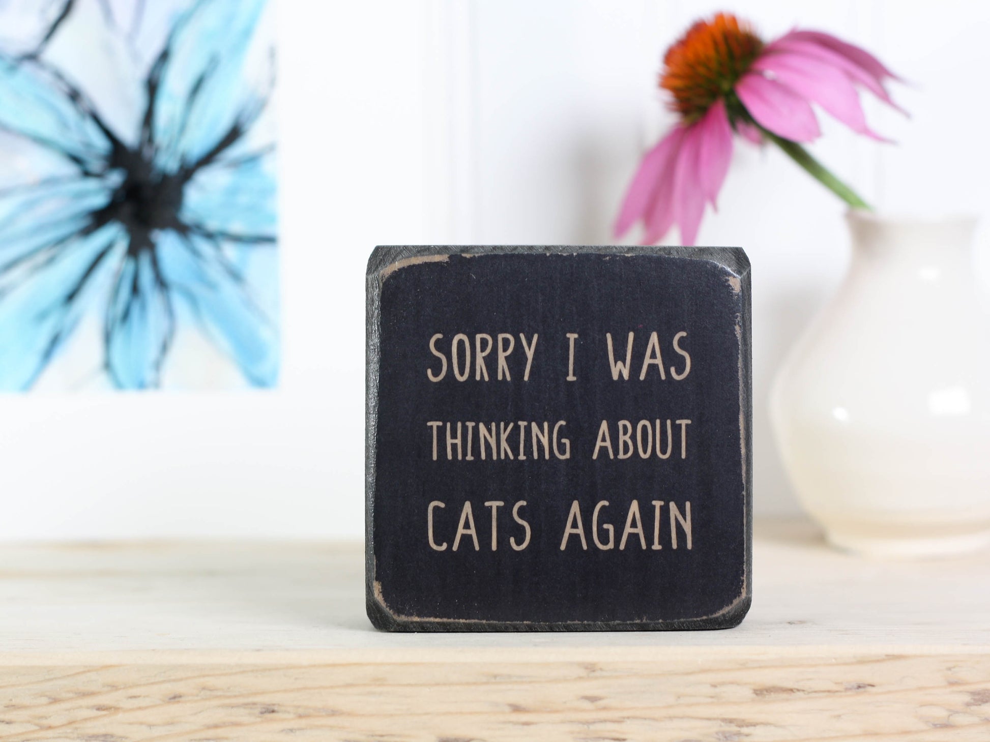 Mini wood sign in distressed black with the saying "Sorry I was thinking about cats again".