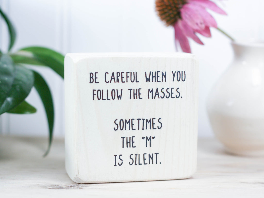 Mini wood shelf decor perfect for the office in whitewash with the saying "Be careful when you follow the masses. Sometimes the "m" is silent."