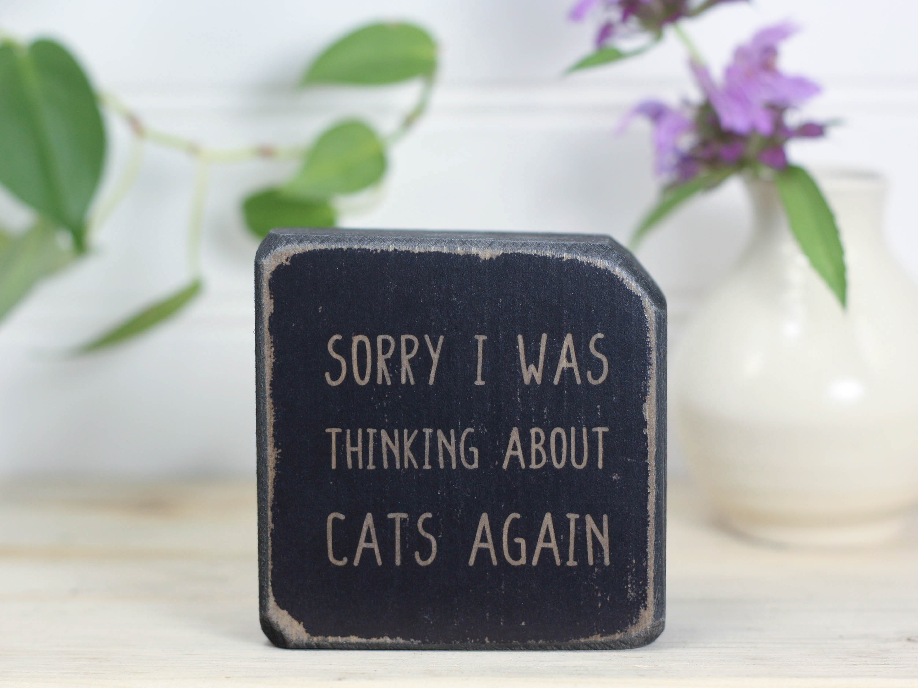 Mini wood sign in distressed black with the saying "Sorry I was thinking about cats again".