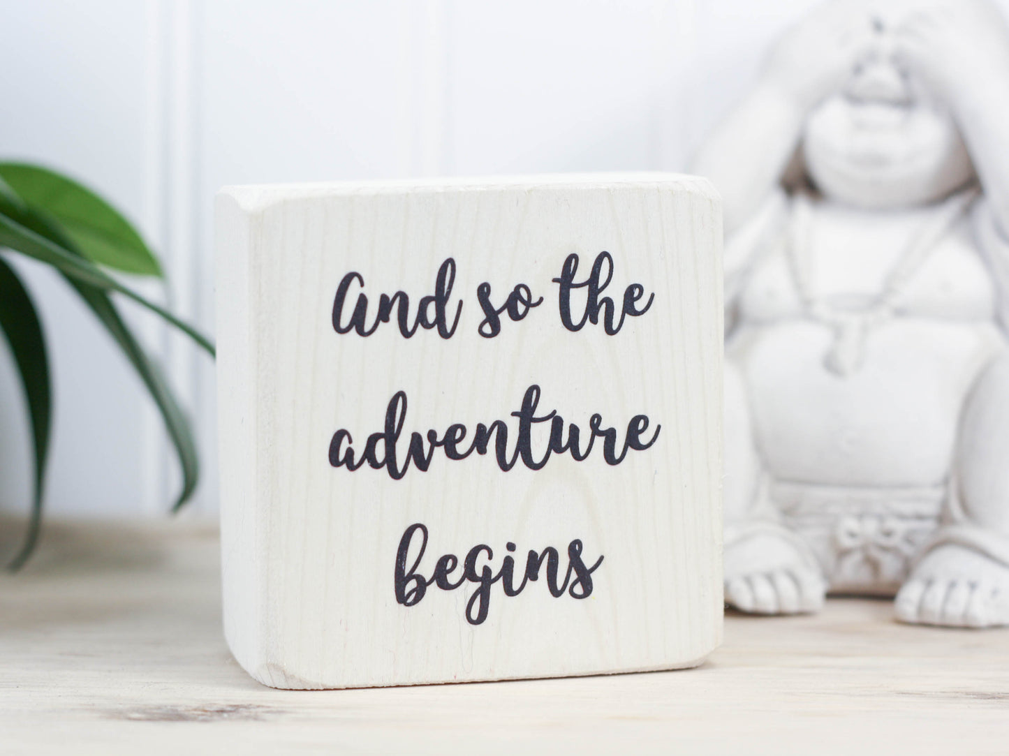 Freestanding decor block makes the perfect gift for the adventurer in your life. Whitewash with the saying "and so the adventure begins".