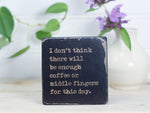 Small freestanding wood sign in distressed black with the saying "I don't think there will be enough coffee or middle fingers for this day."